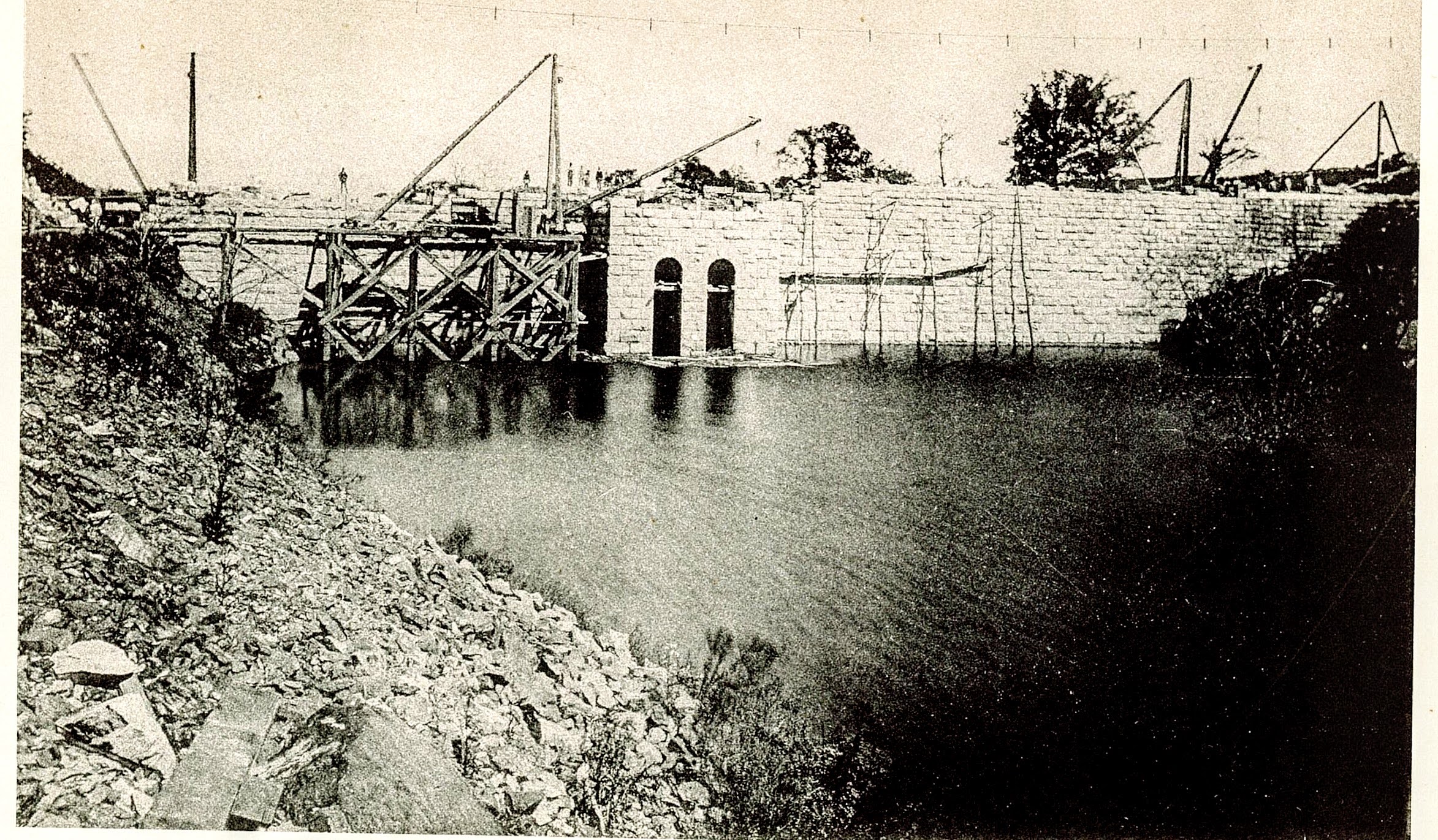 East Branch Reservoir: Back of Masonry Dam During Construction — upstream view, water impounded